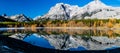 Rockies reflected in Wedge Pond an a crips autumn day. Spray Valley Provincial Park