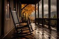 a rocking chair on a covered patio with rain falling in the background