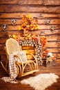 Rocking-chair, fireplace collected from logs, and furs