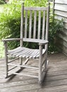 Rocking chair on side of porch Royalty Free Stock Photo