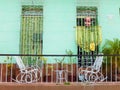 ROCKING CHAIRS ON A BALCONY, TRINIDAD, CUBA