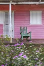 Rocking chairs in front of a home Royalty Free Stock Photo