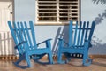 Rocking chairs in front of a home Royalty Free Stock Photo