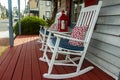 Rocking chairs on a wooden porch of a 19th century home Royalty Free Stock Photo