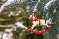 Rocking horse and snowy pine tree decorated for Christmas Royalty Free Stock Photo