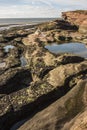 Rockpools and cliff at Hilbre Island, West Kirby, Wirral