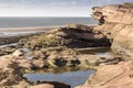 Rockpools and cliff at Hilbre Island, Wirral, England Royalty Free Stock Photo