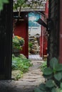 A hidden passage in downtown Rockport, Massachusetts with the harbor in the background. Royalty Free Stock Photo