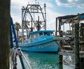 ROCKPORT, TX - 14 FEB 2023: A blue oyster boat CASH ONLY in the marina Royalty Free Stock Photo