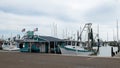 ROCKPORT, TX - 3 FEB 2020: MOMS BAIT SHOP and shrimp boat in marina