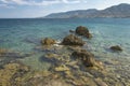 Rocks sea and blue sky, Greek island offshore. Seascape Mytilini. Royalty Free Stock Photo
