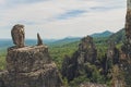 Rocks of Aigir in the smoke of a forest fire. Bashkortostan. Royalty Free Stock Photo