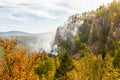 Rocks of Aigir in the smoke of a forest fire. Royalty Free Stock Photo