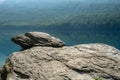 Rocks Along the Shore of Bowman Lake in Glacier Royalty Free Stock Photo
