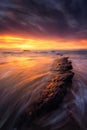 Rocks in Barrika beach at sunset Royalty Free Stock Photo