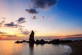 The rocks on the beach, beautiful stone sunset