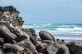 Rocks on the beach. Bethells beach, New Zealand. Royalty Free Stock Photo