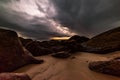 The rocks on the beach are stormy