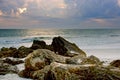 Rocks on the beach at sunset Royalty Free Stock Photo