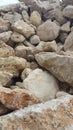 Boulders and rocks that make up a landslide wall