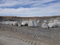 Large huge Pegmatite lithium spodumene Rocks and Boulders in a mine oversize