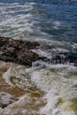Image of rock formations stones, with texture and sharpness, on the beach during the day