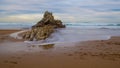 Rocks caressed by the sea on the beach