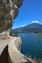 In the rocks carved old road near riva del garda, italy. popular route for hiking Royalty Free Stock Photo