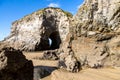 Rocks and caves on Perranporth Beach in Cornwall, on a sunny day Royalty Free Stock Photo