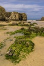 Rocks and Cliffs at Perranporth beach in Cornwall Royalty Free Stock Photo