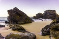 Rocks on coastline of Atlantic ocean on sandy Adraga beach Royalty Free Stock Photo