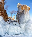 Rocks covered by icicles on winter siberian Baikail lake