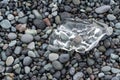 Rocks at Diamond Beach, with a melting ice chunk. Iceland Royalty Free Stock Photo