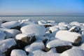 Rocks of Dutch breakwater in wintertime