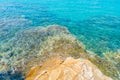 Rocks at edge of invitingly turquoise Mediterranean sea