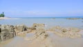 Rocks On The Edge Of The Tropical Beach Of Tanjung Kalian In Summer