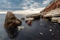 Rocks fallen from cliff over the north sea