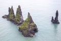 Rocks Fingers Troll. Iceland. Waves of the Atlantic ocean Royalty Free Stock Photo