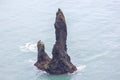 Rocks Fingers Troll. Iceland. Waves of the Atlantic ocean Royalty Free Stock Photo