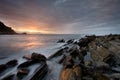 Rocks getting dark in the beach of barrika Royalty Free Stock Photo