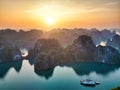 Dreamy sunset among the rocks of Halong Bay, Vietnam