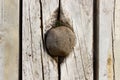 Rocks inside wooden wall