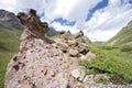 Rocks in mountain grass valley, Caucasus mountains