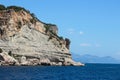 Rocks near the coast of the Mediterranean sea on a background of mountains in Turkey Royalty Free Stock Photo