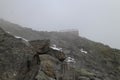 Rocks and Neue Prager HÃÂ¼tte hut, Grossvenediger Royalty Free Stock Photo