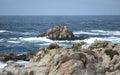 Rocks and the ocean are beautiful at Monterrey Bay. Royalty Free Stock Photo