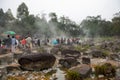 Rocks and people around the hot springs