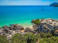 Rocks, ruins and bushes with turquoise water at Galapos Beach, ArrÃ¡bida - SetÃºbal PORTUGAL