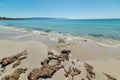 Rocks and sand in Le Bombarde beach in Alghero Royalty Free Stock Photo