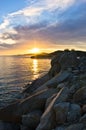 Rocks, sand, sea and a beach with a small cave at sunset, Sithonia Royalty Free Stock Photo